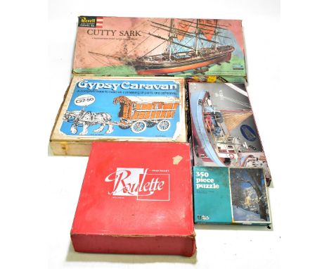 A Chad Valley roulette game in original box, together with a Revell Cutty Sark model in box, a gypsy caravan model in origina