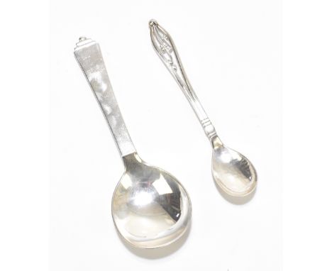 GEORG JENSEN; two sterling silver spoons to include an example decorated in a pyramid pattern, length 13.5cm, approx weight 1