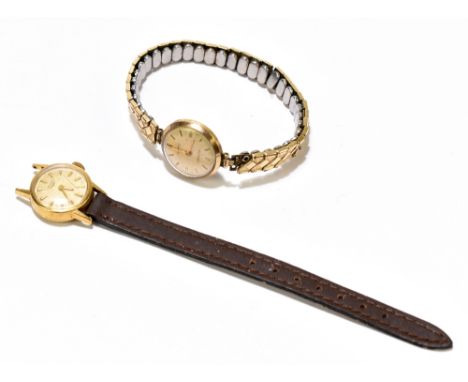 LONGINES; an 18ct gold lady’s wristwatch, with baton dial, with a Rotary 9ct gold wristwatch with a metal flexi-link strap (2