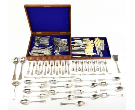 A matched canteen of 19th century Hamburg silver flatware of shaped and scrolled design with engraved initials 'G.T.', compri