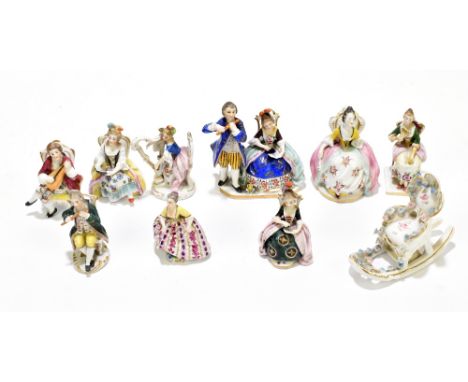 A collection of nine Continental hard paste porcelain miniature figures to include two Capodimonte examples, an example with 