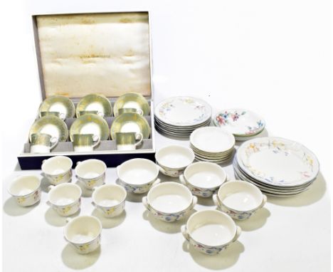 ROYAL WORCESTER; a cased six setting tea service decorated in the 'Balmoral' pattern, comprising six cups, six saucers, toget