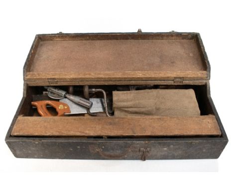 A tool chest housing a group of vintage tools including saw, chisels, brace, etc.Additional InformationHeavy general wear thr