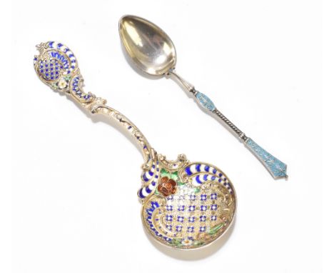 A Russian sterling silver and enamelled teaspoon, the teardrop shaped bowl with blue and white enamel detail to the reverse a