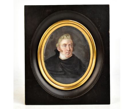 19TH CENTURY FRENCH SCHOOL; watercolour, portrait miniature of a gentleman wearing a black overcoat with white cravat, indist