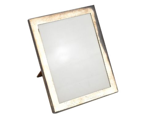 A George V hallmarked silver easel back photograph frame of rectangular form, Birmingham 1920, 20 x 16cm.Additional Informati