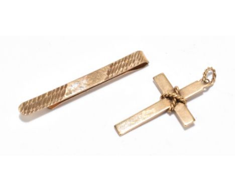 A 9ct yellow gold tie clip with engine turned decoration, together with a 9ct yellow gold crucifix, approx weight 3.7g (2).Ad