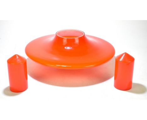 A retro orange and opaque glass ceiling light shade, diameter 44cm, and a pair of smaller spherical shades, height 15cm.Addit