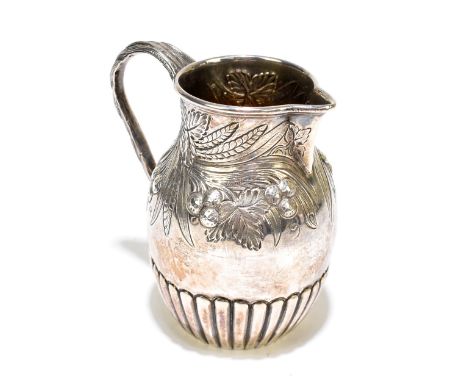 HILLIARD &amp; THOMASON; a Victorian hallmarked silver cream jug with sparrow beak, natural modelled twist handle and part ga