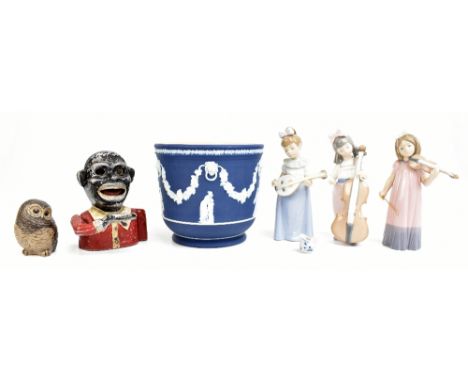 NAO; three boxed figures to include a girl playing the violin, together with further ceramics to include a Poole Pottery ston