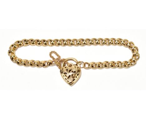 A 9ct yellow gold bracelet with pierced heart shaped padlock clasp, with safety chain, approx 15.8g.Additional InformationOve