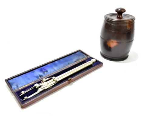 A 20th century lignum vitae tobacco jar and cover, height 14cm, together with a cased compass by Chadburn &amp; Sons of Liver