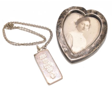 W J MYATT &amp; CO; a George V hallmarked silver mounted heart shaped photograph frame, Birmingham 1910, 7 x 5.8cm (af), and 