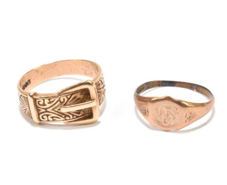 A 9ct yellow gold buckle ring with engraved detail, size T1/2, and a 9ct signet ring, size P, approx 8.3g (2).