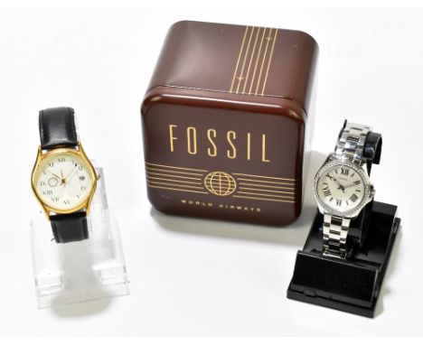 FOSSIL; a lady's stainless steel World Airways wristwatch, the circular dial set with Roman numerals and a gold plated and st