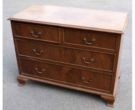 A reproduction mahogany chest of two short above two long drawers, on ogee bracket feet, height 78cm, width 107cm, depth 52cm