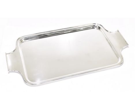 BIRCH &amp; GAYDON LTD; a George V hallmarked silver dressing table tray of rounded rectangular form, London 1934, length 38c