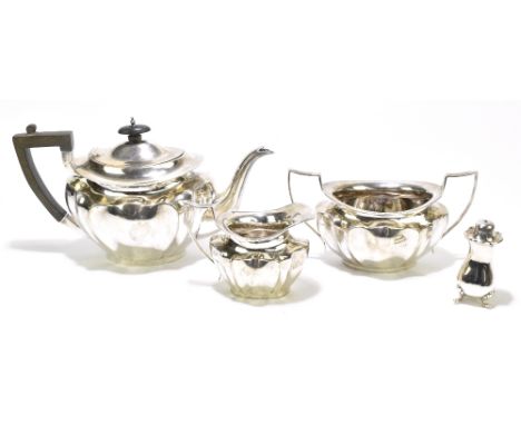 JOHN &amp; WILLIAM DEAKIN; an Edward VII hallmarked silver three piece tea set comprising teapot with ebonised handle, length