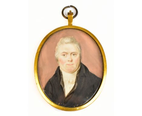LATE 18TH/EARLY 19TH CENTURY; watercolour, portrait miniature, quarter length, a gentleman wearing a black coat with tied sto