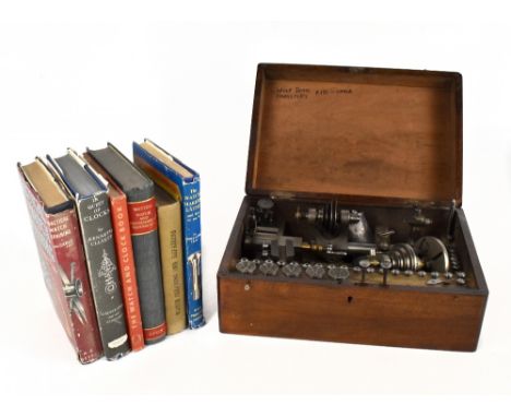 A watchmaker's lathe attributed to Welf Jahn of Frankfurt in original mahogany case, and six books on watchmaking and related