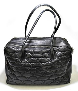 LULU GUINNESS; a large black soft leather handbag embossed with iconic lip design, with silver tone hardware, two large zip t