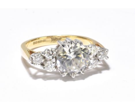 An 18ct yellow gold diamond and moissanite dress ring, size M 1/2, approx. 5.6g.Additional InformationMarks, scratches and ta