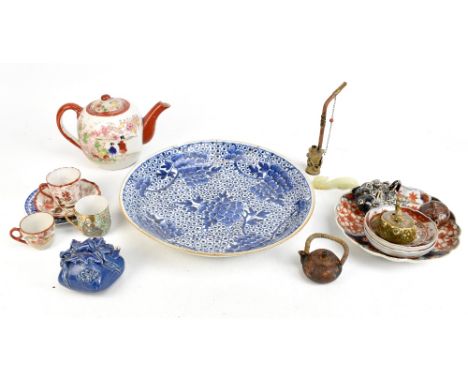 A late 18th century Chinese blue and white porcelain bowl painted with lotus flowers, diameter 34cm, together with four Chine