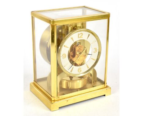 JAEGER-LECOULTRE; a gilt brass Atmos clock with Arabic numeral and baton chapter ring, the top plate numbered 266989, in orig