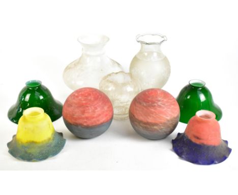 Nine coloured oil lamp and further clear and coloured glass lamp shades, including mottled examples.Additional InformationSom