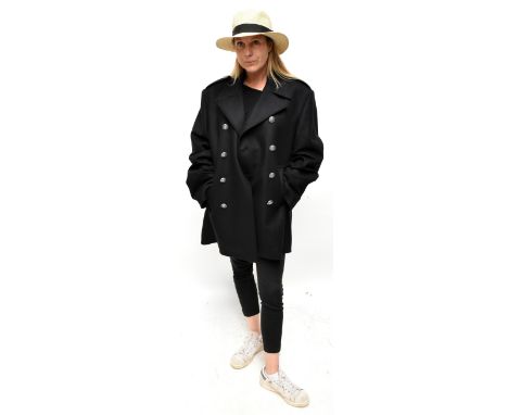 CHARLES TYRWHITT; a 100% wool and cashmere double breasted navy blue short pea coat with large gunmetal tone buttons, shoulde