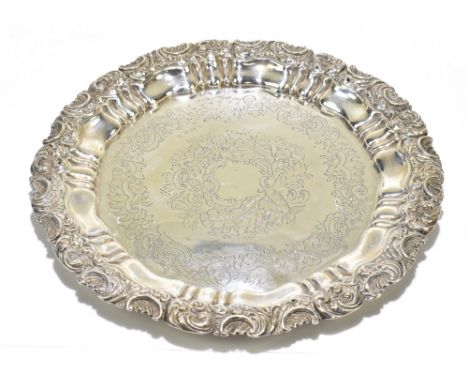 GREENBERG &amp; CO; a Victorian hallmarked silver salver, with engraved ‘C’ scroll and foliate detailing within a moulded scr