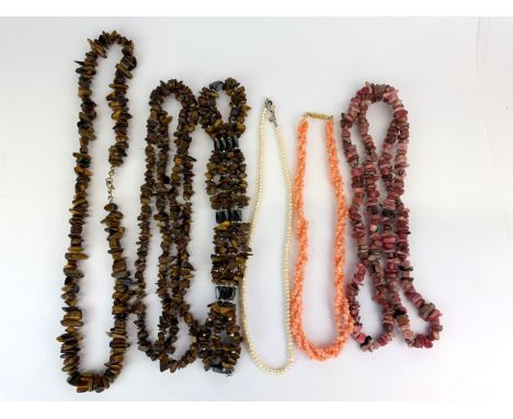 A group of semi-precious stone necklaces including cultured pearl, tiger's eye and coral necklaces, longest L. 45cm.