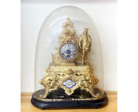 A 19th Century French spelter and porcelain mantle clock under dome, overall  H. 48cm.