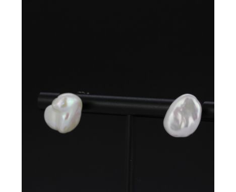 A pair of 14ct white gold baroque pearl stud earrings, L. 1.3cm.