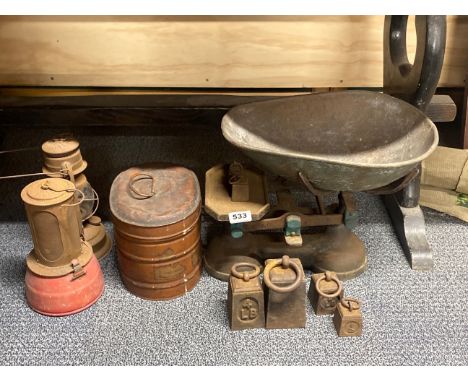 A large vintage scale and weights with other items.