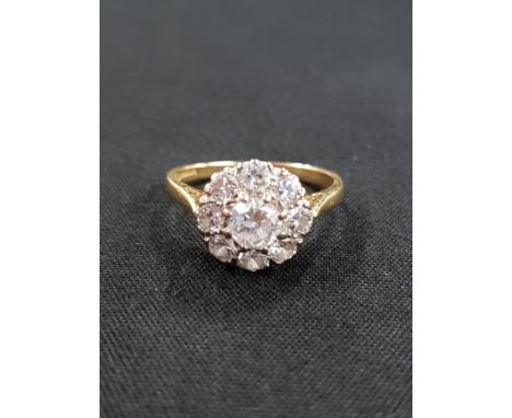 18 CARAT GOLD AND DIAMOND CLUSTER RING CIRCA 1.25 CARAT