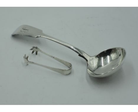 A Victorian silver sauce ladle of fiddle back form bearing monogram to terminal, London 1843, Jacob Wintle, and a small pair 