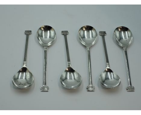 A set of six silver dessert spoons having architectural design to stems and terminals, Sheffield 1930, Thomas Bradbury &amp; 