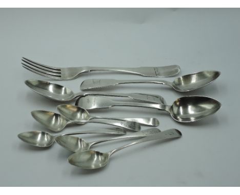 A selection of Georgian silver flatware including three Irish silver dessert spoons of fiddle rat tail form, Dublin 1829/30, 