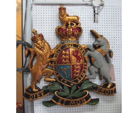WALL PLAQUE COAT OF ARMS, in a resin painted finish, 76cm H.