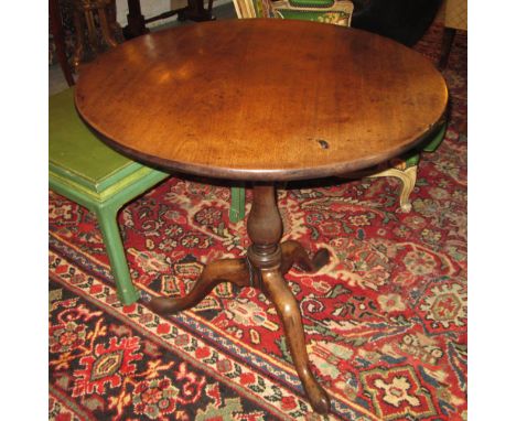 TRIPOD TABLE, George III mahogany with circular top on a turned column, 75cm x 74cm H.