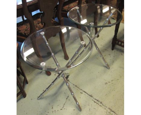 OCCASIONAL TABLES, a pair, with circular bevelled glass tops on tripod chrome effect faux bamboo bases, 51cm diam x 60cm H. (