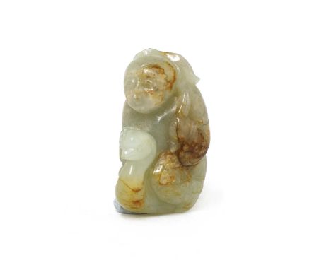 A Chinese jade carving,Qing dynasty (1644-1911), of a boy riding a goose, carrying a lotus flower and leaf on his back, the s