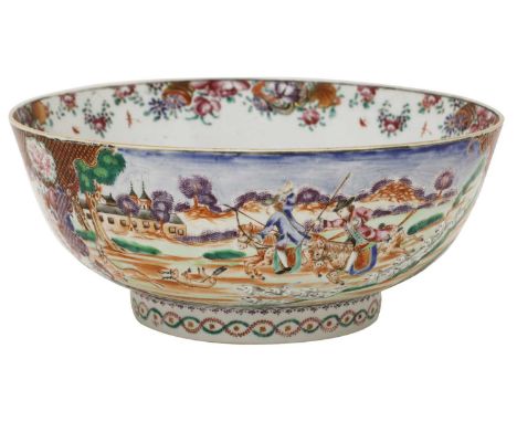 A Chinese export famille rose punch bowl,Qianlong (1736-1795), in the Mandarin palette, painted with hunting scenes with two 
