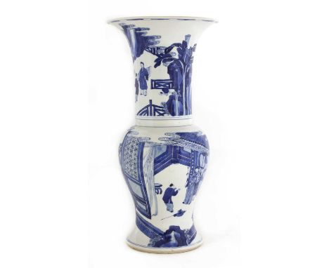 A Chinese blue and white 'phoenix tail' vase,Kangxi (1662-1722), of baluster form with a flared rim, painted in bright shades