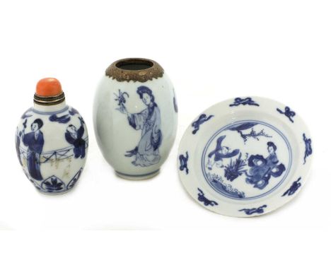 A collection of Chinese blue and white,comprising:a saucer, Kangxi (1662-1722), painted with a lady and a boy in a garden, fo