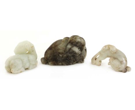 A Chinese white jade camel,late Qing dynasty, the recumbent beast with its head turned to the back, the stone in a white tone