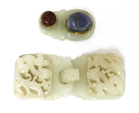 A Chinese jade belt buckle,Qing dynasty (1644-1911), each half carved to one side in openwork with a clambering chilong grasp