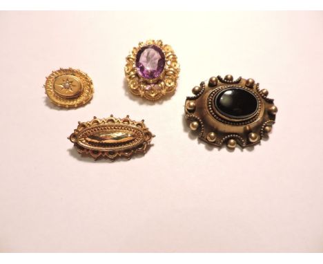 A late Victorian gold Etruscan style oval brooch, star set with a split pearl, a 9ct gold bar brooch, Birmingham 1900, an ame