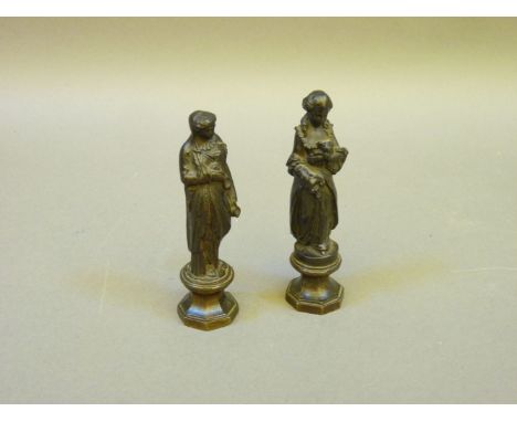 A pair of miniature bronze figures